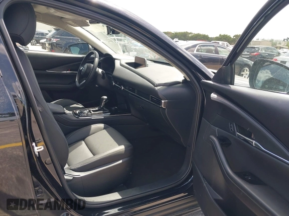 2025 Mazda CX-30 S Preferred with VIN 3MVDMBCM0SM798708, listed as a IAAI auction lot 42133091 with 4,305 mi miles and . Bid and sale history available at DreamBid. Image 5.