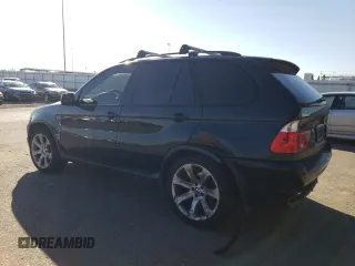 2005 BMW X5 4.8is with VIN 5UXFA93515LE83489, listed as a Copart auction lot 87840265 with 131,786 mi miles and Salvage Title. Bid and sale history available at carsss.com. Image 2.