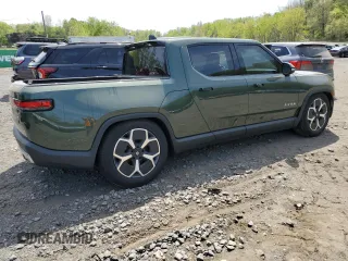 2024 Rivian R1T Adventure z VIN 7FCTGCAA1RN030829, wystawiony jako Copart lot #55557565 z przebiegiem Nie podano mil oraz Szkody całkowita. Historia ofert i sprzedaży dostępna na DreamBid. Obrazek 3.