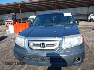 2011 Honda Pilot LX with VIN 5FNYF4H22BB028742, listed as a IAAI auction lot 41856146 with 190,615 mi miles. Bid and sale history available at carsss.com. Image 12.