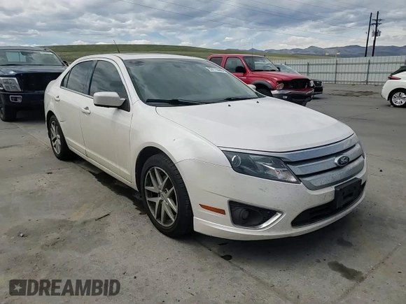 2012 Ford Fusion SEL z VIN 3FAHP0JAXCR282521, wystawiony jako Copart lot #53115505 z przebiegiem 96 833 mil mil oraz Szkoda całkowita • Salvage title. Historia ofert i sprzedaży dostępna na DreamBid. Obrazek 10.