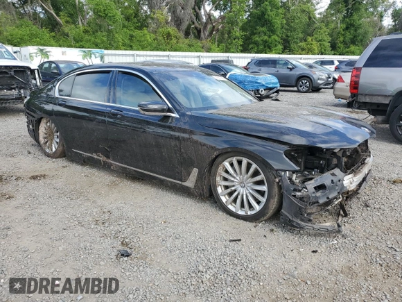2017 BMW 7 Series 740i with VIN WBA7E2C50HG740358, listed as a Copart auction lot 51601995 with 0 mi miles and Non Repairable. Bid and sale history available at carsss.com. Image 4.