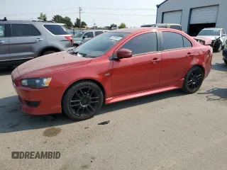 2015 Mitsubishi Lancer ES with VIN JA32U2FU2FU008586, listed as a Copart auction lot 70018914 with 129,990 mi miles and Salvage Title. Bid and sale history available at carsss.com. Image 1.