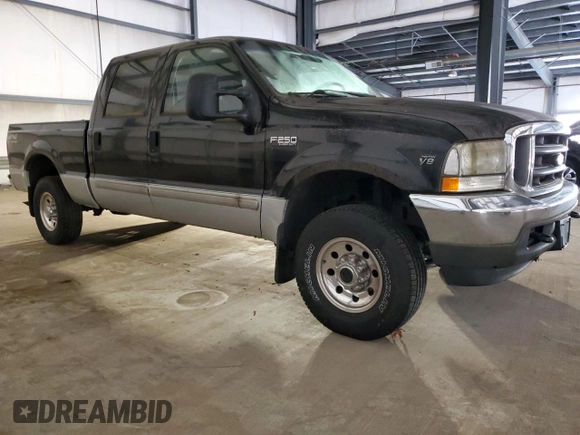 2002 Ford Super Duty F-250 XL with VIN 1FTNW21L02EC99052, listed as a Copart auction lot 76759774 with 84,467 mi miles and Clean Title. Bid and sale history available at carsss.com. Image 4.