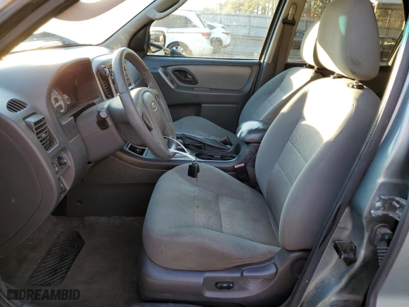2007 Ford Escape XLT with VIN 1FMYU03167KB88321, listed as a Copart auction lot 86617164 with 261,561 mi miles and Salvage Title. Bid and sale history available at carsss.com. Image 7.