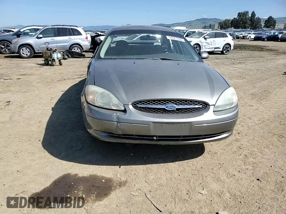 2002 Ford Taurus SE Standard with VIN 1FAFP53U12G271134, listed as a Copart auction lot 51671555 with 65,311 mi miles and Salvage title. Bid and sale history available at DreamBid. Image 11.