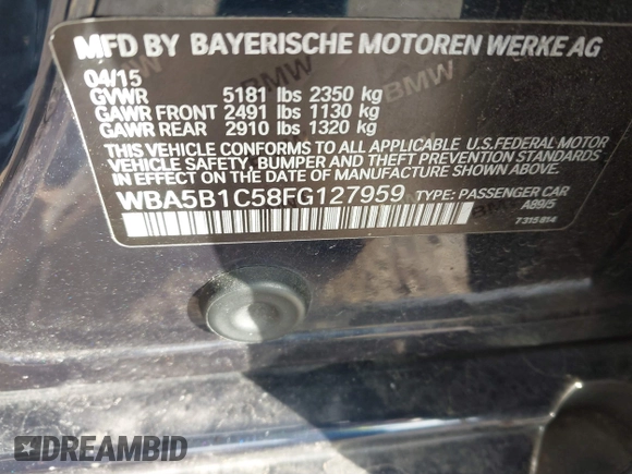2015 BMW 5 Series 535i with VIN WBA5B1C58FG127959, listed as a IAAI auction lot 41571017 with 122,274 mi miles and . Bid and sale history available at carsss.com. Image 9.
