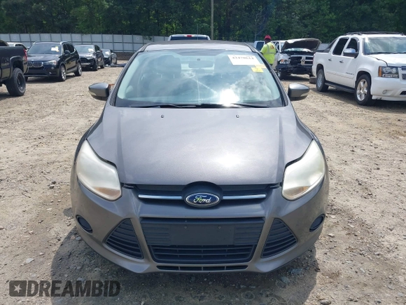 2013 Ford Focus SE z VIN 1FADP3F27DL267203, wystawiony jako IAAI lot #42470614 z przebiegiem 180 153 mil mil oraz . Historia ofert i sprzedaży dostępna na DreamBid. Obrazek 13.