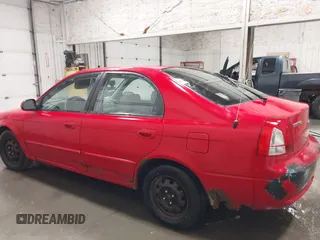 2003 Kia Spectra GS z VIN KNAFB161035115874, wystawiony jako IAAI lot #42179809 z przebiegiem 127 594 mil mil oraz . Historia ofert i sprzedaży dostępna na DreamBid. Obrazek 14.