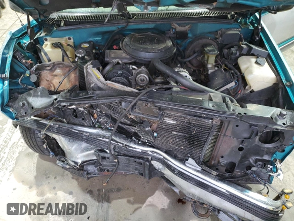 1995 GMC Sierra 1500 z VIN 2GTEK19K5S1509969, wystawiony jako Copart lot #42945545 z przebiegiem 361 334 mil mil oraz Szkody całkowita. Historia ofert i sprzedaży dostępna na DreamBid. Obrazek 12.