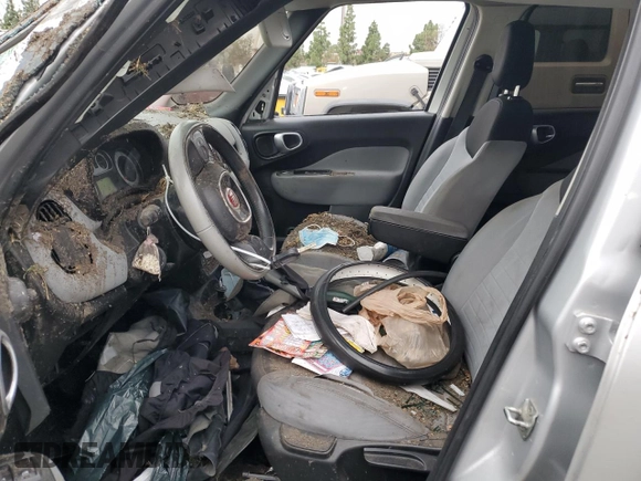 2014 FIAT 500L Easy with VIN ZFBCFABH0EZ024955, listed as a Copart auction lot 82365864 with Not Provided miles and Salvage Title. Bid and sale history available at DreamBid. Image 7.