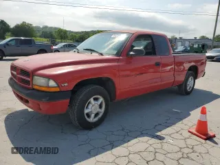 1999 Dodge Dakota SLT z VIN 1B7GL22X6XS243645, wystawiony jako Copart lot #54258675 z przebiegiem 114 362 mil mil oraz Czysty tytuł • Clean title. Historia ofert i sprzedaży dostępna na DreamBid. Obrazek 1.