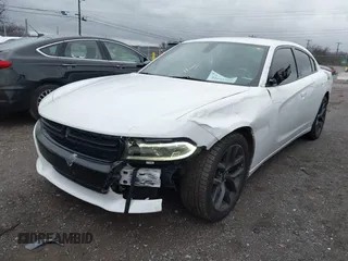 2019 Dodge Charger SXT with VIN 2C3CDXBG9KH598841, listed as a IAAI auction lot 41093938 with 112,359 mi miles. Bid and sale history available at carsss.com. Image 2.