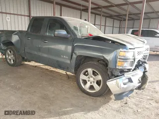 2014 Chevrolet Silverado 1500 LT with VIN 1GCRCREC4EZ296598, listed as a IAAI auction lot 41425582 with 140,620 mi miles. Bid and sale history available at carsss.com. Image 1.