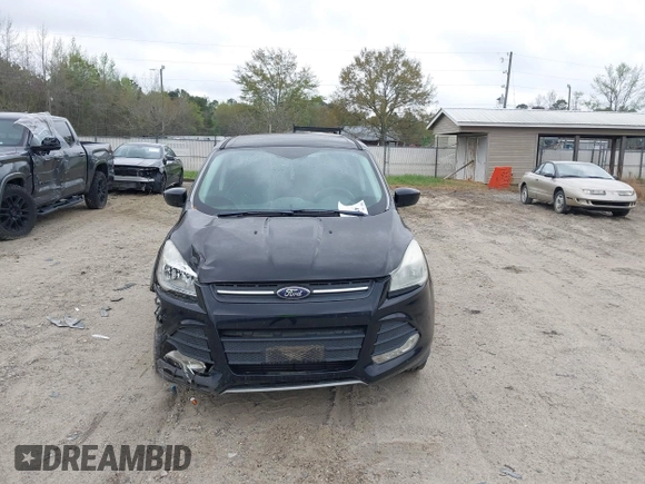 2016 Ford Escape SE with VIN 1FMCU9G99GUC13053, listed as a IAAI auction lot 41888535 with 84,019 mi miles. Bid and sale history available at carsss.com. Image 12.