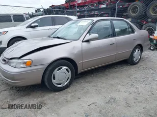 1998 Toyota Corolla VE z VIN 2T1BR18EXWC015480, wystawiony jako IAAI lot #41959316 z przebiegiem 224 304 mil mil oraz . Historia ofert i sprzedaży dostępna na DreamBid. Obrazek 17.