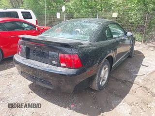 2001 Ford Mustang Standard with VIN 1FAFP40451F161190, listed as a IAAI auction lot 42152309 with 105,951 mi miles. Bid and sale history available at carsss.com. Image 4.