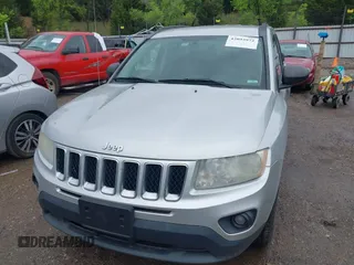 2011 Jeep Compass Latitude with VIN 1J4NF1FB5BD244624, listed as a IAAI auction lot 42093972 with 198,431 mi miles. Bid and sale history available at carsss.com. Image 6.