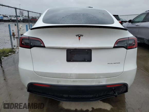 2022 Tesla Model Y Long Range with VIN 7SAYGDEE1NF491488, listed as a Copart auction lot 49266945 with 44,703 mi miles and Salvage Title. Bid and sale history available at carsss.com. Image 6.