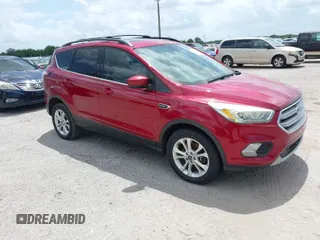 2017 Ford Escape SE z VIN 1FMCU0G93HUB96487, wystawiony jako IAAI lot #42011689 z przebiegiem 180 522 mil mil oraz . Historia ofert i sprzedaży dostępna na DreamBid. Obrazek 1.
