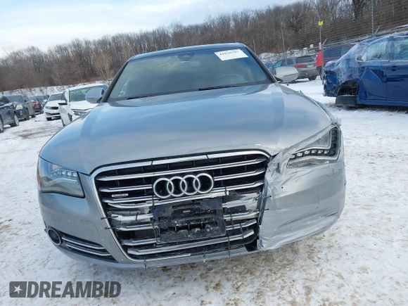 2012 Audi A8 with VIN WAURVAFD8CN017206, listed as a IAAI auction lot 41626707 with 138,922 mi miles and . Bid and sale history available at DreamBid. Image 12.
