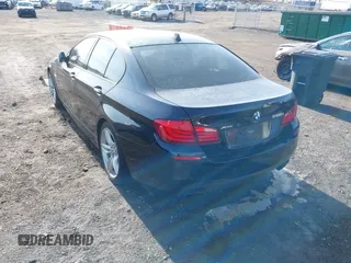 2013 BMW 5 Series 550i xDrive with VIN WBAFU9C52DDY70807, listed as a IAAI auction lot 41663855 with 92,009 mi miles and . Bid and sale history available at carsss.com. Image 3.