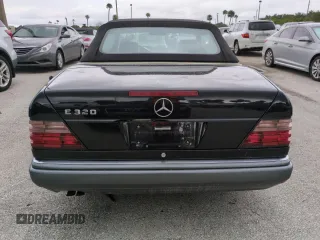 1995 Mercedes-Benz E Class with VIN WDBEA66EXSC281846, listed as a Copart auction lot 75006754 with 83,067 mi miles and Salvage Title. Bid and sale history available at carsss.com. Image 6.