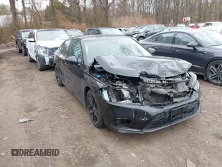2022 Honda Civic Sport with VIN 2HGFE2F51NH505799, listed as a IAAI auction lot 41850770 with 36,069 mi miles and . Bid and sale history available at carsss.com. Image 1.