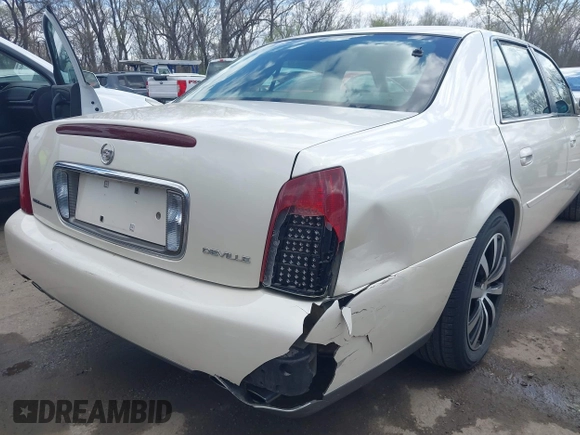 2003 Cadillac DeVille z VIN 1G6KD54Y13U208351, wystawiony jako IAAI lot #41889713 z przebiegiem 132 774 mil mil oraz . Historia ofert i sprzedaży dostępna na DreamBid. Obrazek 6.