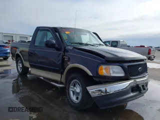 2000 Ford F-150 XL with VIN 1FTRX17L2YNB85627, listed as a IAAI auction lot 41377814 with 123,740 mi miles. Bid and sale history available at carsss.com. Image 1.