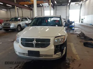 2009 Dodge Caliber SXT with VIN 1B3HB48A89D116734, listed as a IAAI auction lot 41959281 with 209,136 mi miles and . Bid and sale history available at DreamBid. Image 13.