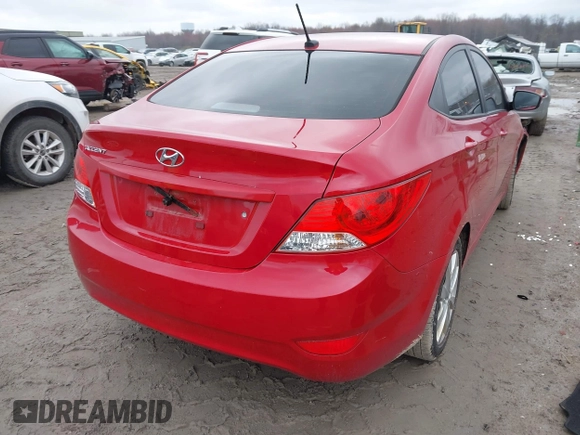 2013 Hyundai Accent GLS with VIN KMHCU4AE7DU461600, listed as a IAAI auction lot 42019159 with 53,452 mi miles. Bid and sale history available at carsss.com. Image 4.