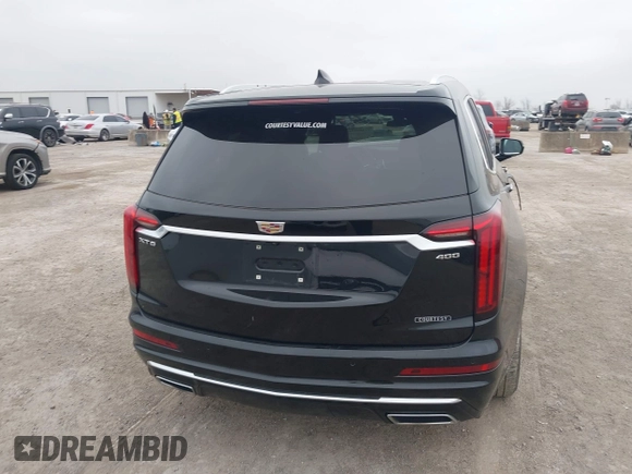 2023 Cadillac XT6 FWD Premium Luxury with VIN 1GYKPCRS8PZ231089, listed as a IAAI auction lot 41500954 with 36,455 mi miles and . Bid and sale history available at DreamBid. Image 16.