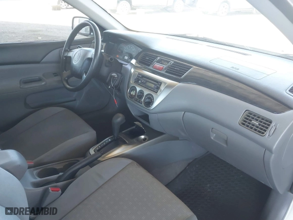 2004 Mitsubishi Lancer ES with VIN JA3AJ26E14U065498, listed as a IAAI auction lot 41887945 with 142,632 mi miles. Bid and sale history available at carsss.com. Image 5.