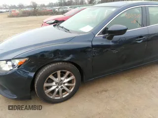 2015 Mazda 6 i Sport with VIN JM1GJ1U51F1185105, listed as a IAAI auction lot 41287570 with 133,016 mi miles and . Bid and sale history available at carsss.com. Image 6.