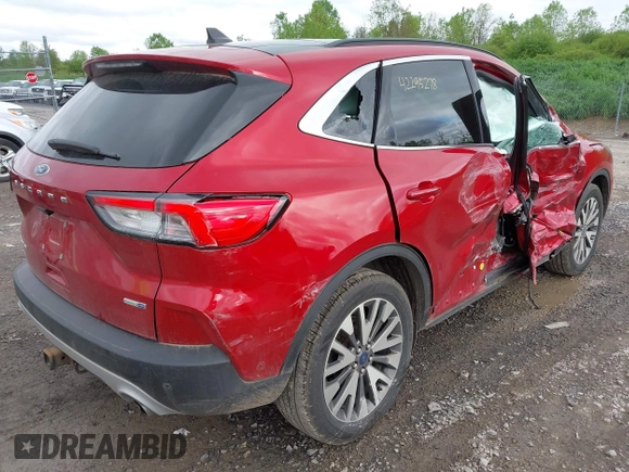 2020 Ford Escape Titanium with VIN 1FMCU9J99LUB28104, listed as a IAAI auction lot 42295278 with 73,706 mi miles and . Bid and sale history available at DreamBid. Image 4.