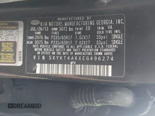 2014 Kia Sorento LX z VIN 5XYKT4A6XEG496274, wystawiony jako IAAI lot #42077337 z przebiegiem Nie podano mil oraz . Historia ofert i sprzedaży dostępna na DreamBid. Obrazek 9.