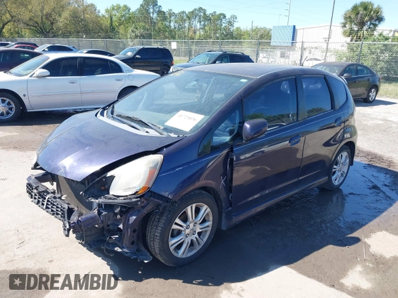2009 Honda Fit Sport z VIN JHMGE88409S030427, wystawiony jako IAAI lot #41723036 z przebiegiem 146 586 mil mil oraz . Historia ofert i sprzedaży dostępna na DreamBid. Obrazek 2.