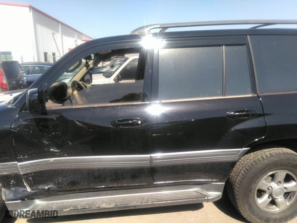 2001 Toyota Land Cruiser with VIN JTEHT05J512016563, listed as a IAAI auction lot 41868193 with 247,653 mi miles. Bid and sale history available at carsss.com. Image 14.