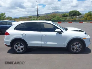 2014 Porsche Cayenne with VIN WP1AA2A22ELA97168, listed as a IAAI auction lot 42315149 with 99,183 mi miles and . Bid and sale history available at DreamBid. Image 14.