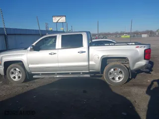 2014 Chevrolet Silverado 1500 LTZ with VIN 3GCUKSEC3EG400650, listed as a IAAI auction lot 41596087 with 127,240 mi miles. Bid and sale history available at carsss.com. Image 14.