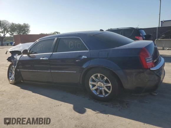 2005 Chrysler 300 with VIN 2C3AA63HX5H655263, listed as a Copart auction lot 52492635 with 168,602 mi miles and Salvage Title. Bid and sale history available at carsss.com. Image 2.