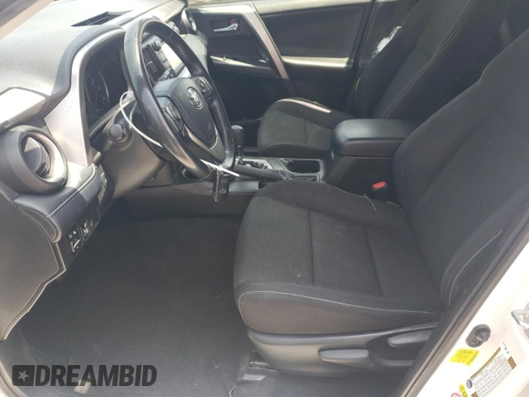 2018 Toyota RAV4 XLE with VIN JTMWFREVXJD118021, listed as a Copart auction lot 58845805 with 108,068 mi miles and Salvage title. Bid and sale history available at DreamBid. Image 7.