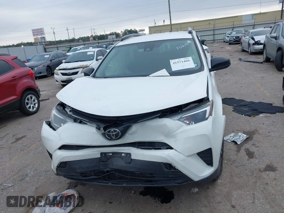 2017 Toyota RAV4 LE with VIN JTMZFREV1HJ103223, listed as a IAAI auction lot 41571466 with 96,860 mi miles and . Bid and sale history available at carsss.com. Image 12.