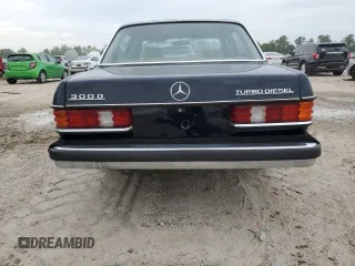 1984 Mercedes-Benz 300 with VIN WDBAB33A9EA047709, listed as a Copart auction lot 68974194 with 86,301 mi miles and Salvage Title. Bid and sale history available at carsss.com. Image 6.