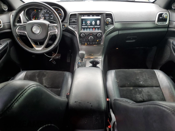 2018 Jeep Grand Cherokee Altitude with VIN 1C4RJFAG5JC219944, listed as a Copart auction lot 52030365 with 99,463 mi miles and Salvage title. Bid and sale history available at DreamBid. Image 8.