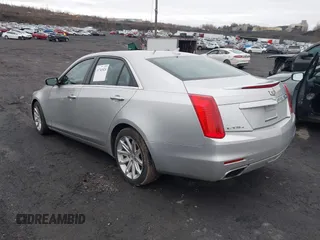 2014 Cadillac CTS Luxury AWD z VIN 1G6AX5SX3E0194895, wystawiony jako IAAI lot #41741824 z przebiegiem 197 042 mil mil oraz . Historia ofert i sprzedaży dostępna na DreamBid. Obrazek 3.