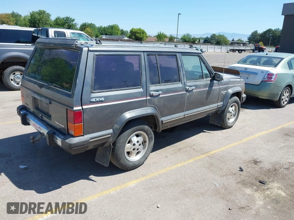 1987 Jeep Cherokee with VIN 1JCML7849HT112362, listed as a IAAI auction lot 42646285 with 162,661 mi miles and . Bid and sale history available at DreamBid. Image 4.