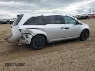2014 Honda Odyssey LX z VIN 5FNRL5H21EB106600, wystawiony jako Copart lot #57875765 z przebiegiem 122 159 mil mil oraz Szkoda całkowita • Salvage title. Historia ofert i sprzedaży dostępna na DreamBid. Obrazek 3.