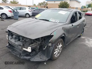 2015 Mazda 3 i Touring with VIN JM1BM1L7XF1261134, listed as a IAAI auction lot 42164554 with 130,570 mi miles and . Bid and sale history available at DreamBid. Image 2.